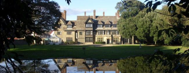 View of frontage of Sizewell Hall, Suffolk from across the main lawn.
